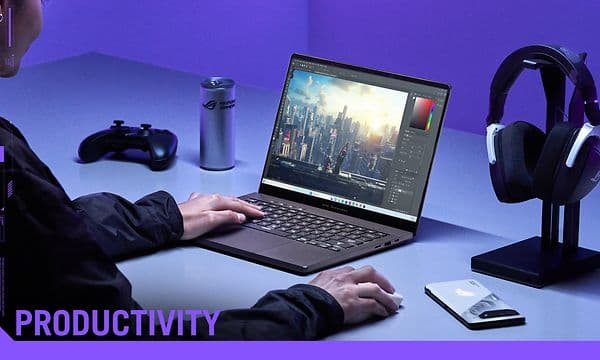 Person som bruker ROG ZEPHYRUS G14 PC og kontroll med hodetelefoner og mobiltelefon