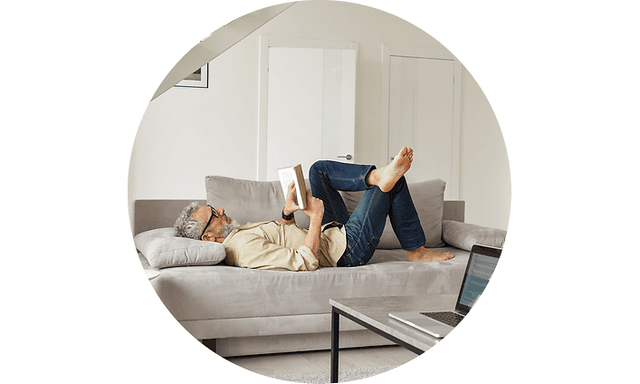 Man reading on coach
