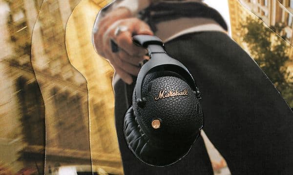 Low angle person holding Marshall Monitor in the streets