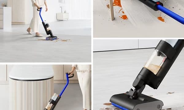 Dyson G1 robot vacuum in silver with a sleek, circular design on a white background.