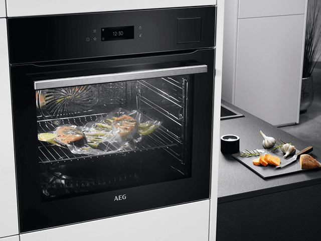 Oven with steam function and sous vide food prepared inside the oven