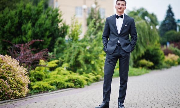 Boy dressed up in suit for celebration day