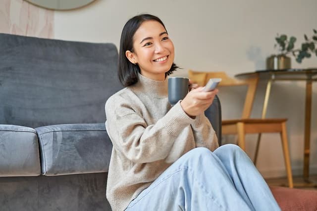 Woman with remote
