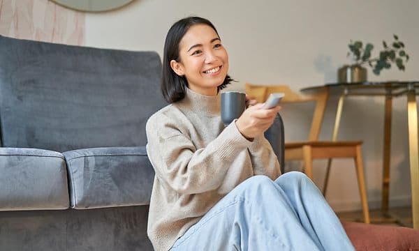 Woman with remote