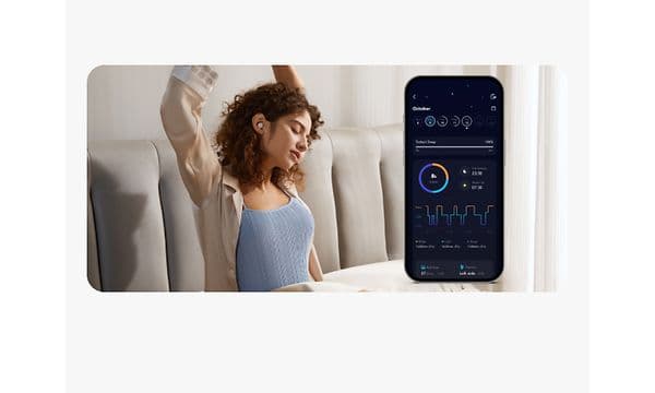 Woman with Soundcore Sleep and mobile