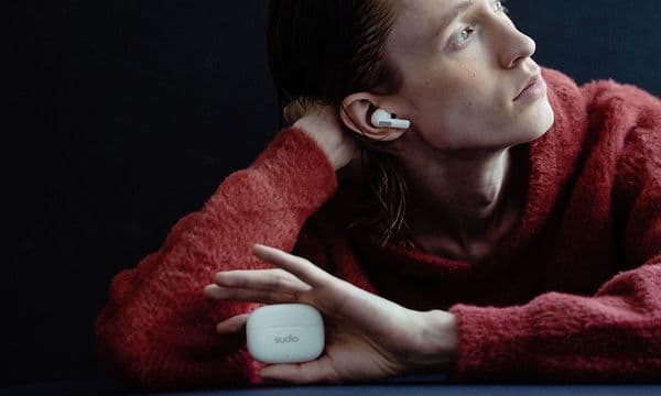 Woman with Sudio D1 pro in ears