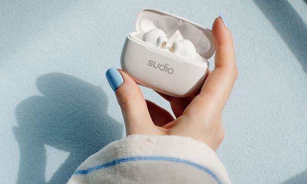 Woman holding Sudio D1 pro