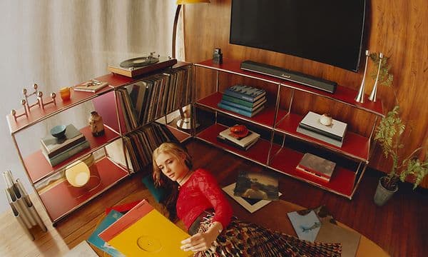 HESTON-60-woman looking at LPs