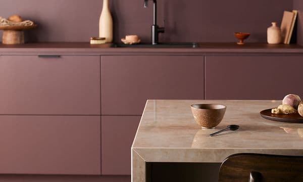 Epoq - Dekton worktop in a purple Epoq kitchen