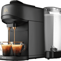 L’Or Barista kapselmaskine og to kopper kaffe