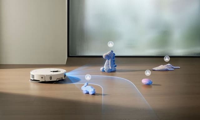 illustrerar robotdammsugare som arbetar runt leksaker och andra hinder på golvet