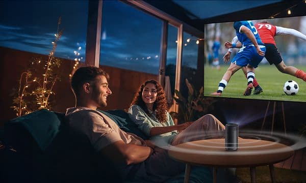 Capsule 3 - Couple watching projected football