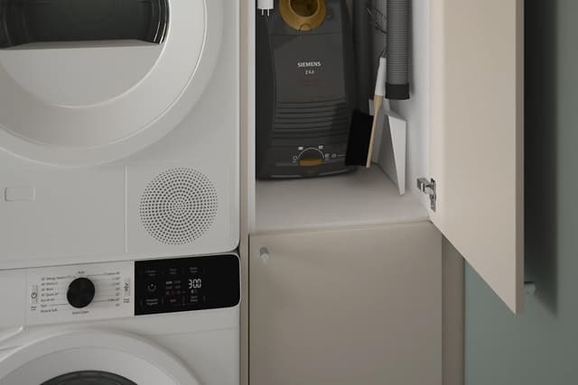 EPOQ tvättstuga: Core Grey Mist, en beige tvättstuga med tvättmaskin och torktumlare.