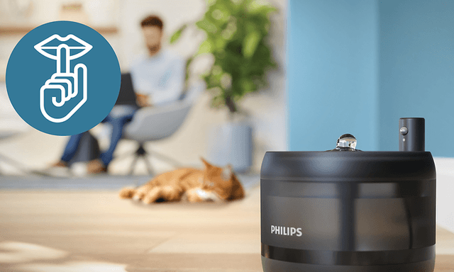 Philips Pet Series vandfontæne og kat og mand i baggrunden