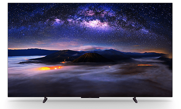 Et Sony BRAVIA 6 OLED-TV viser et billede af bjerge og en nattehimmel på skærmen på en hvid baggrund