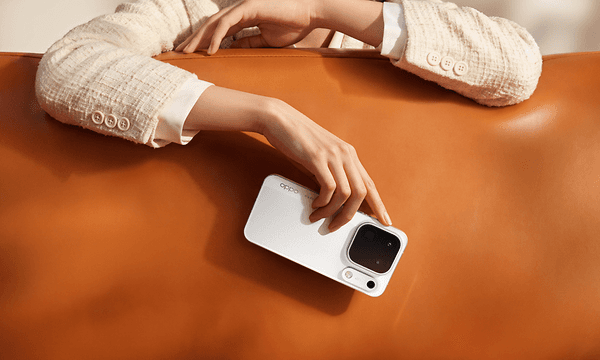 Oppo-X10 phone in hand-orange