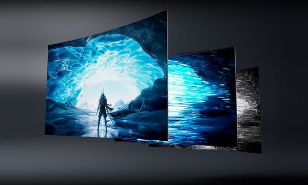 Scene fra et spil med en person i en grotte på en TCL-gamingskærm, der illustrerer de forskellige lyslag